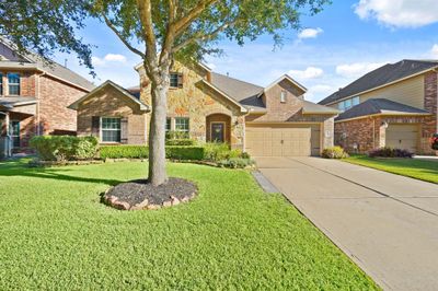 Welcome to 21330 Hawkley Drive! This 2-story foyer offers 3, 686 sqft of living space, 4 bathrooms, and 3 full bathrooms. | Image 1