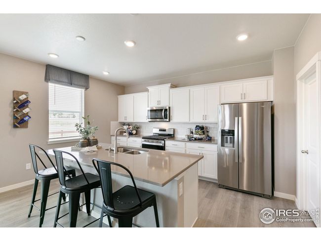 6015 Holstein Dr, House other with 4 bedrooms, 3 bathrooms and null parking in Windsor CO | Image 7