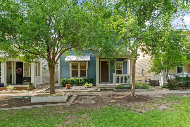 Mature trees provide shade and a peaceful front porch! | Image 4