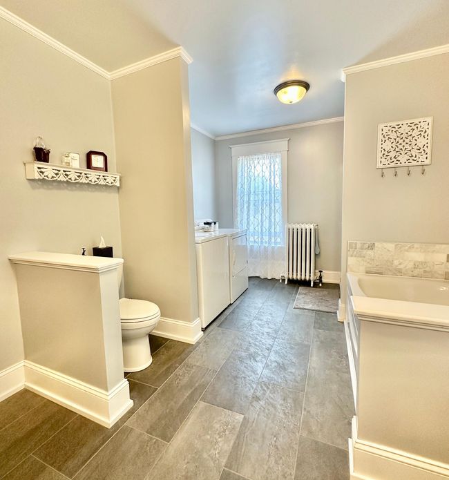 Second floor bathroom and laundry area | Image 38