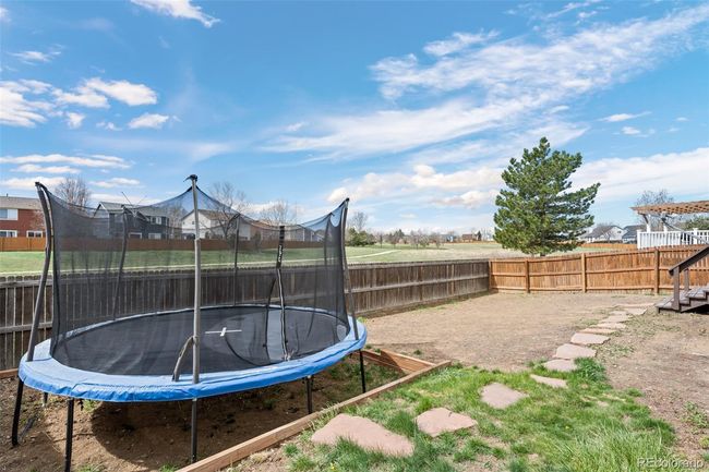 Trampoline included! Larger backyard size! | Image 23
