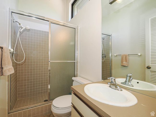 Full bathroom with a stall shower and vanity | Image 40