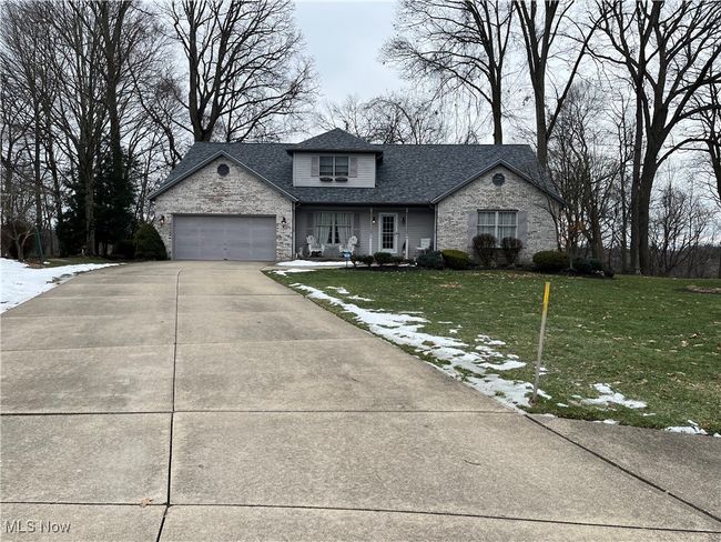view of the house from the cul de sac street | Image 49