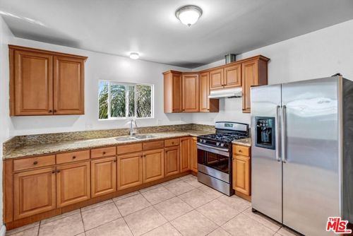 5319 S Normandie Ave, Los Angeles, CA, 90037-3411 | Card Image