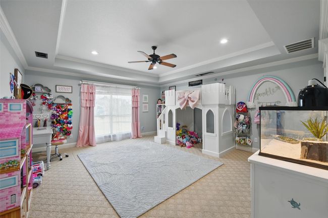 Multi Purpose room used as Bedroom 4 with access to back patio | Image 35