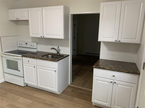 99 Tower St, Huntington Station, NY, 11746-1234 | Card Image