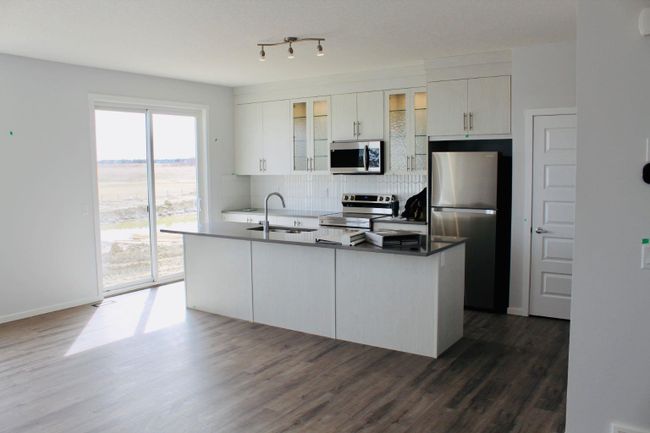 116 Cityline Square Ne, Home with 3 bedrooms, 2 bathrooms and 3 parking in Calgary AB | Image 3