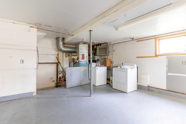 1008 Shawnee Dr Sw, House other with 3 bedrooms, 4 bathrooms and 6 parking in Calgary AB | Image 40