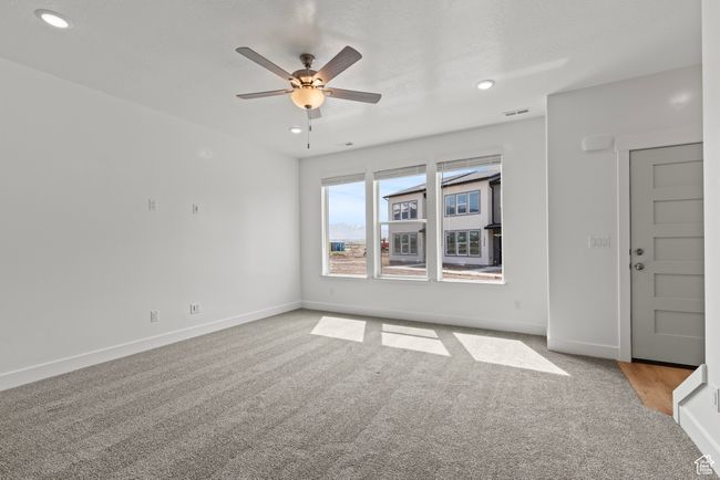 Spare room with recessed lighting, carpet flooring, baseboards, and ceiling fan | Image 7