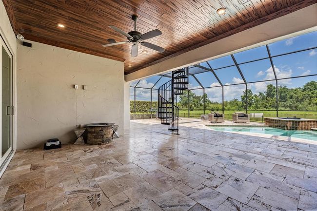 upstairs bonus room w/french doors to the lanai | Image 35