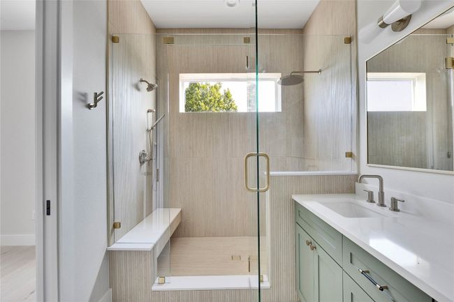 Bathroom featuring vanity and a shower stall | Image 31