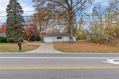 View of front facade with a garage | Image 1