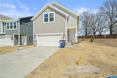 View of front facade with a garage | Image 2