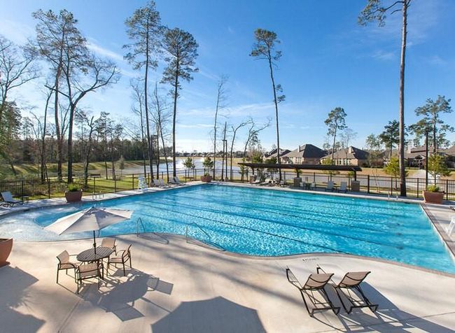 Experience the luxury of a 7-lap Olympic-size swimming pool within the community, offering ample space for both serious swimmers and leisurely enjoyment. | Image 23