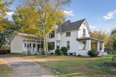 Welcome to 5013 Hwy 47 in Dalbo. This beautiful farm house was originally built in 1904 with a large addition added on in 1993. | Image 1