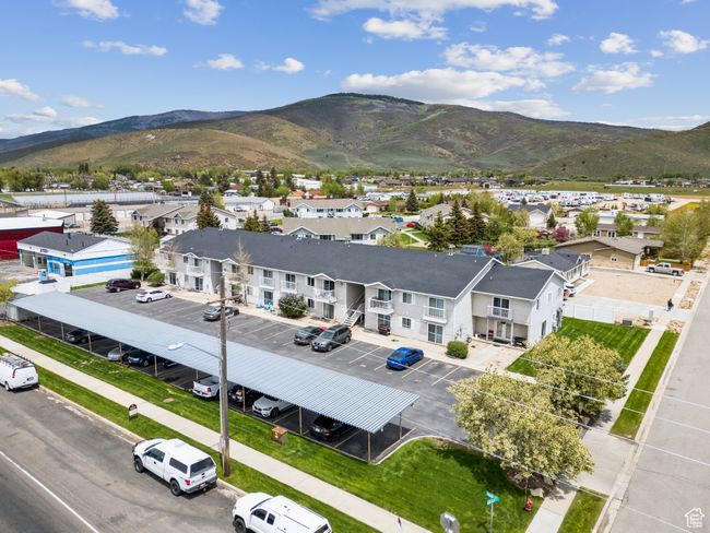 Aerial perspective of suburban area with mountains | Image 30