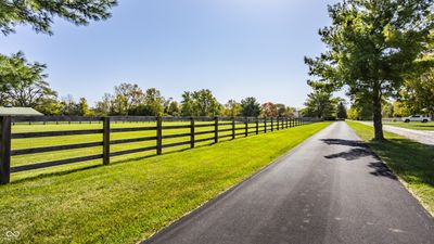 Welcome to 8727 W 96th Street in the Horse country of Zionsville! follow the asphalt drive along the front pasture to a quiet retreat. | Image 2