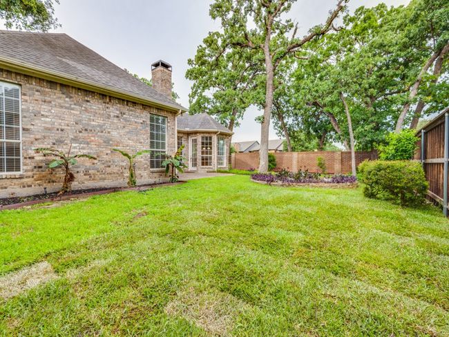Nice size yard fenced yard. Plenty of space for a pool. | Image 27