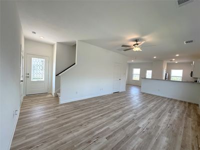 Luxury vinyl plank flooring throughout Family, Dining and Kitchen. | Image 3