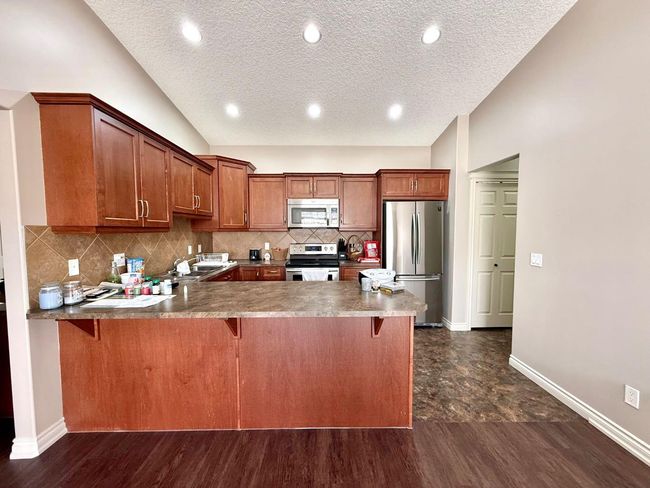 304 Sunvale Cres Ne, Townhouse with 2 bedrooms, 1 bathrooms and 2 parking in High River AB | Image 10
