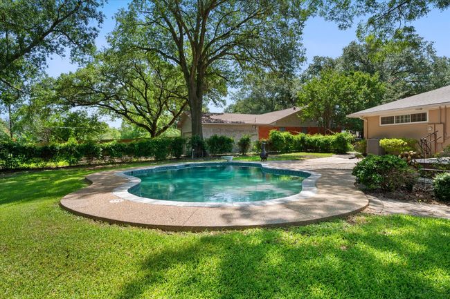 Inviting pool with diving board | Image 37