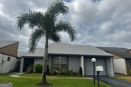 9801 Maplecrest Cir, LEHIGH ACRES, FL, 33936-5952 | Card Image