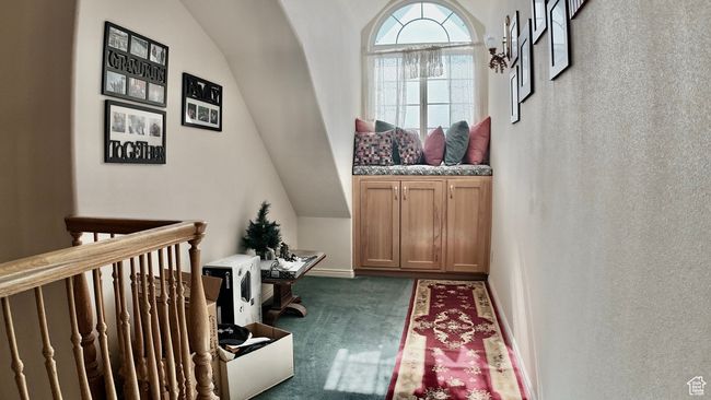 Doorway featuring carpet and lofted ceiling | Image 51