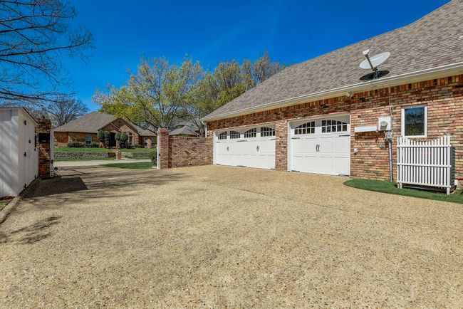 Private, gated, side entry three car garage | Image 38