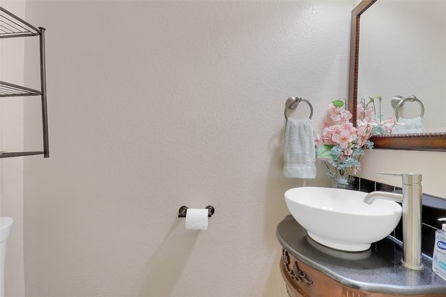 Updated half bath off living | Image 12