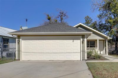 Ranch-style home with a garage | Image 2