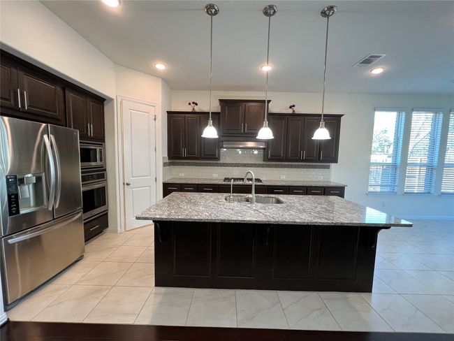 Granite counter tops and SS appliances!! SS Fridge included!! | Image 6