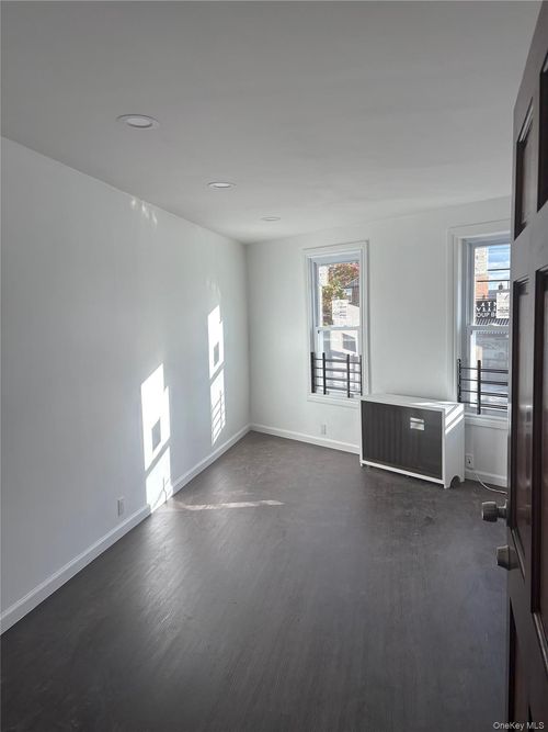 10705 Rockaway Blvd, Ozone Park, NY, 11417-2309 | Card Image