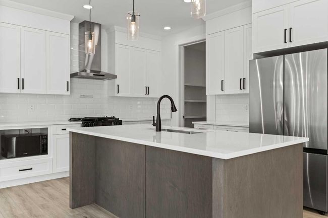 271 Kinniburgh Loop, House other with 4 bedrooms, 3 bathrooms and 4 parking in Chestermere AB | Image 14