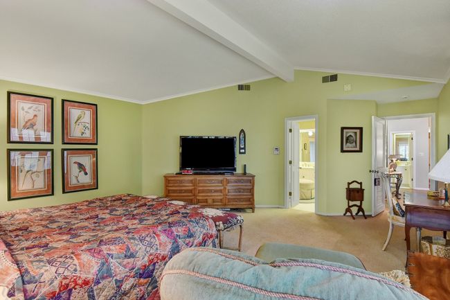 Bedroom with carpet, ensuite bath, and baseboards | Image 22