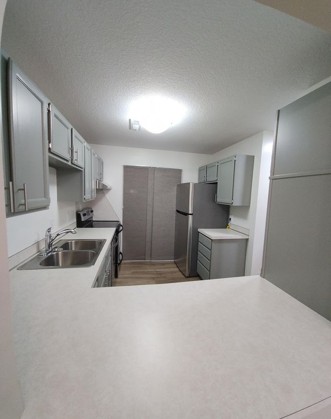 Kitchen view from pass-through | Image 11
