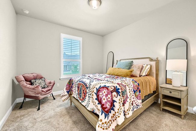Carpeted bedroom with baseboards | Image 29