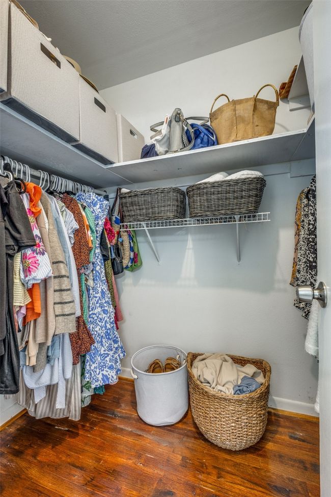 Walk in closet with wood-type flooring | Image 32