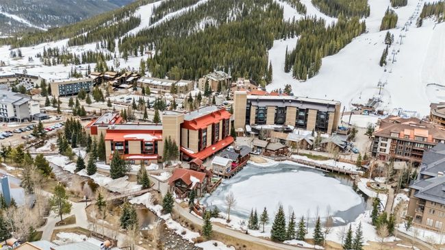 Snowy aerial view featuring a mountain view | Image 24