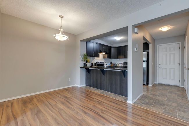 960 Windsong Dr Sw, Home with 3 bedrooms, 2 bathrooms and 4 parking in Airdrie AB | Image 9