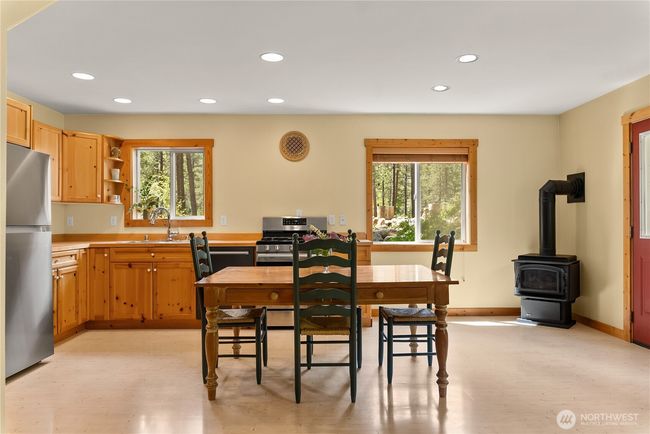 Adjacent pantry, laundry/storage closet for added convenience and efficient use of space | Image 24