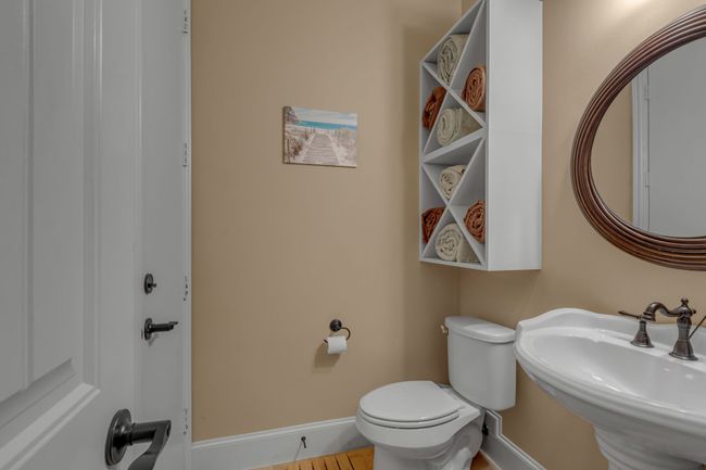 Half bath that also leads to the back patio | Image 21