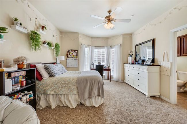 Four spacious bedrooms all have en-suite bathrooms and walk-in closets. | Image 7