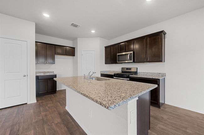 164 Frogmore Loop, House other with 4 bedrooms, 3 bathrooms and 2 parking in Uhland TX | Image 10