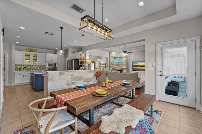 Desirable open floor plan is perfect for entertaining & for when everyone wants to share time together | Image 12