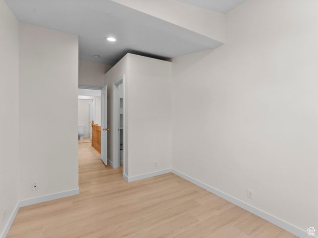 Spare room with light wood finished floors and recessed lighting | Image 17
