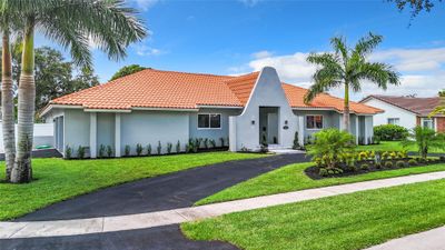 7000 Sw 7th St, House other with 4 bedrooms, 3 bathrooms and null parking in Plantation FL | Image 1