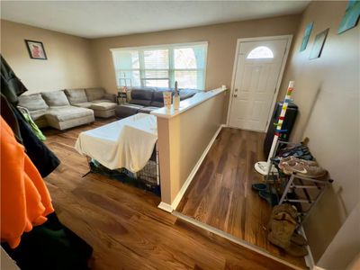 Living room with hardwood / wood-style floors | Image 3