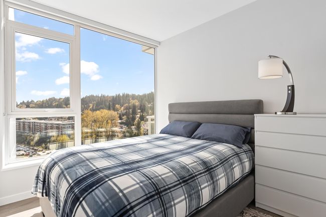 Bedroom featuring wood finished floors and baseboards | Image 18