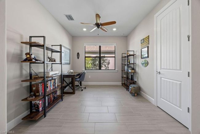 Office area featuring recessed lighting, a ceiling fan, visible vents, and baseboards | Image 7