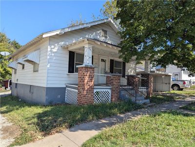 Bungalow-style house with a porch | Image 1